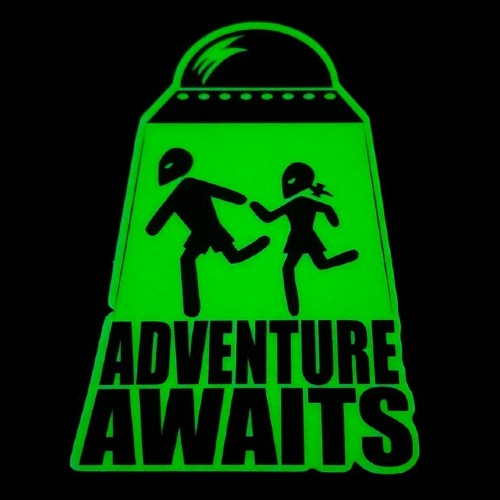 A neon green glow in the dark sticker that says adventure awaits